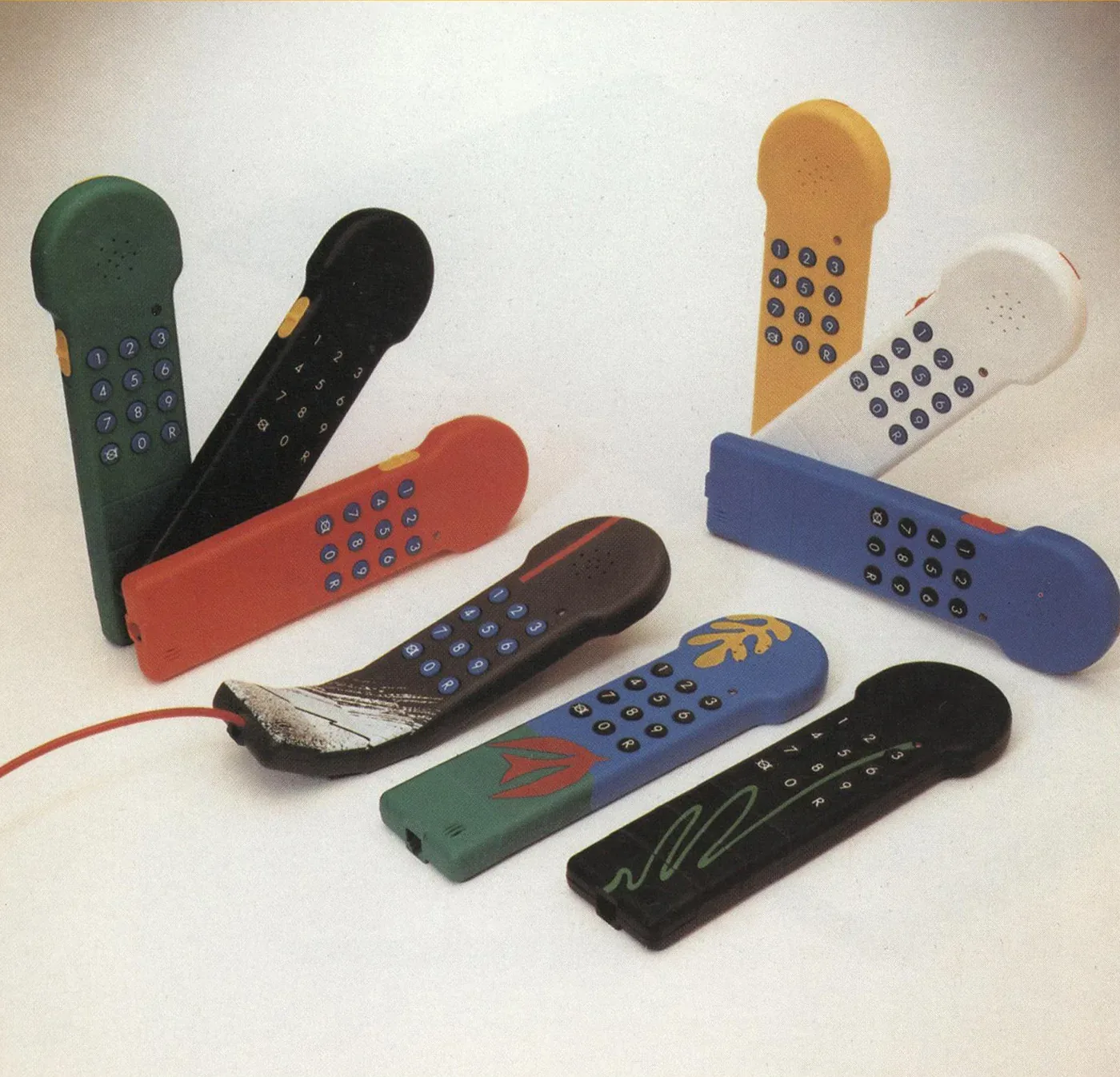 Switel telephone handsets in several colours and printed finishes
