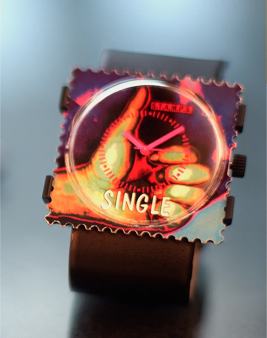 A STAMPS watch with a printed foil dial