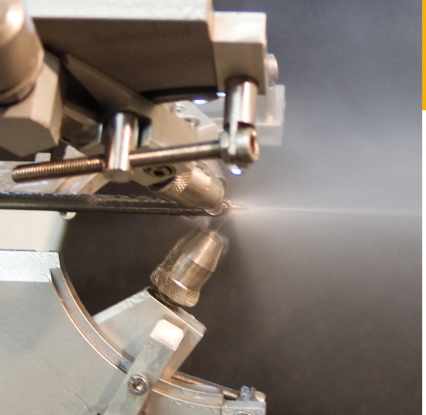 Atomised water from impinging jets