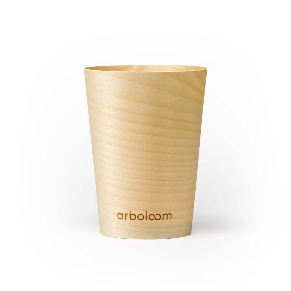 An Arboloom compostable wood-veneer cup