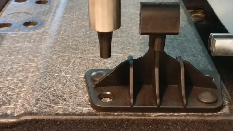 A steel bracket going onto a composite part - no hole drilled first